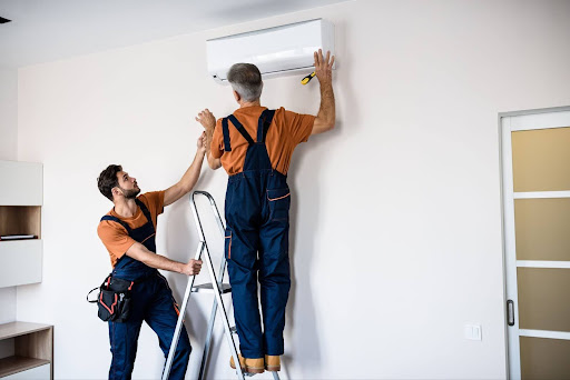 aircon experts working on aircon